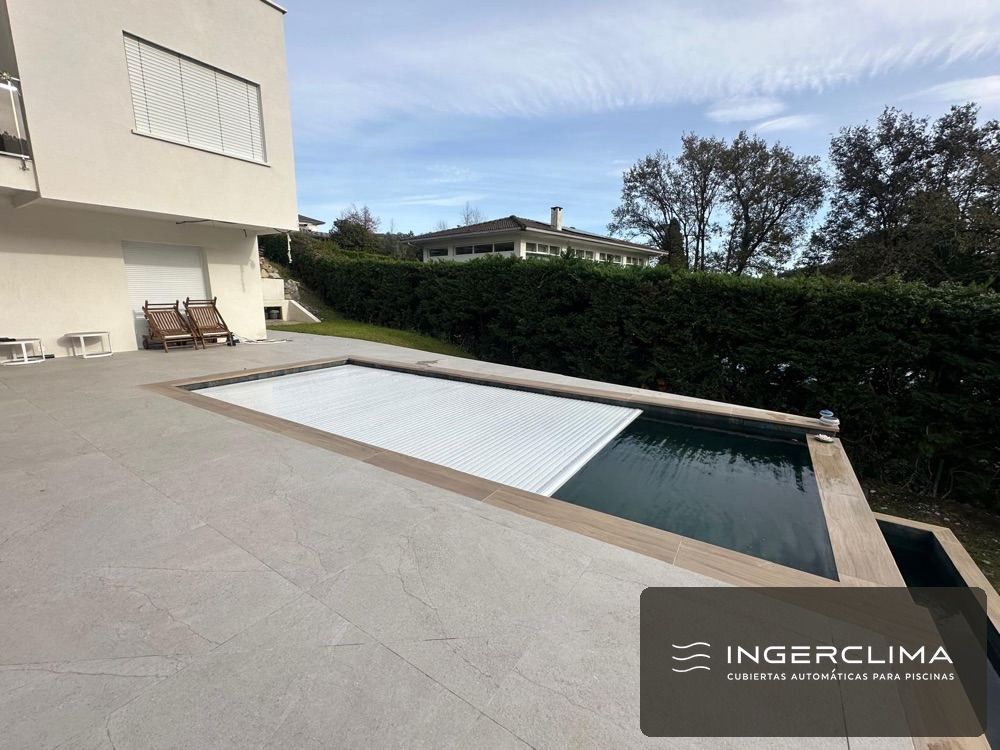 Completed project — automatic pool cover with mountain views